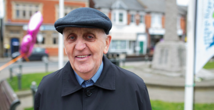 Elderly white male with a hat on. 