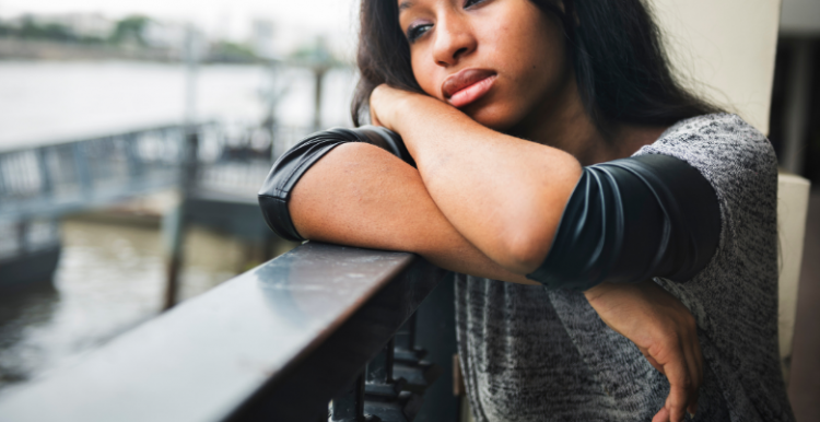 Young black female looking sad