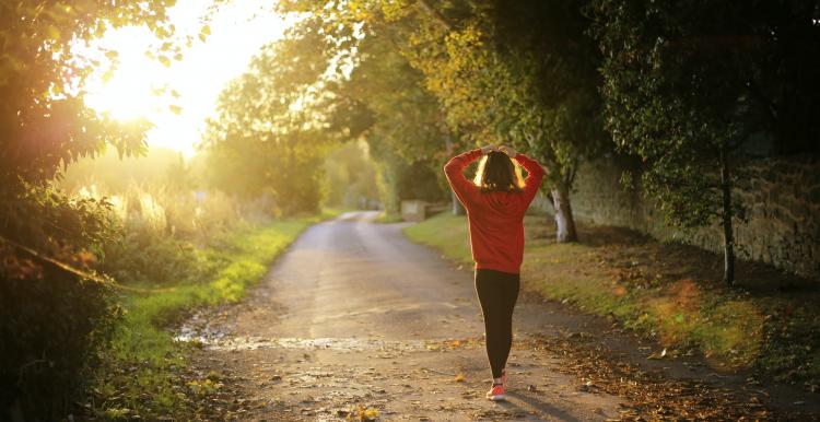 Woman walking on a path