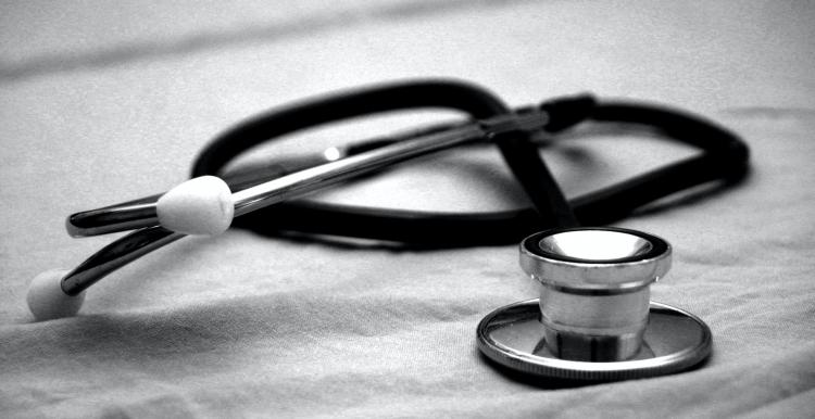 black and white photo of doctor's stethoscope