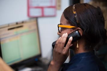 Young lady talking on the telephone 