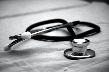 black and white photo of doctor's stethoscope